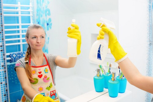 Office cleaner working in a BR3 business reception area