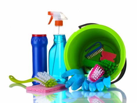 Cleaner working in a BR3 family home kitchen and living area