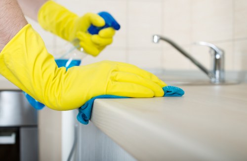 Safety-focused carpet cleaning team managing a tidy work area